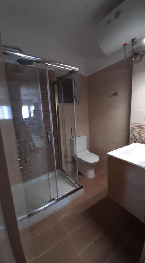 Tasias Apartments Ликсури Экстерьер фото