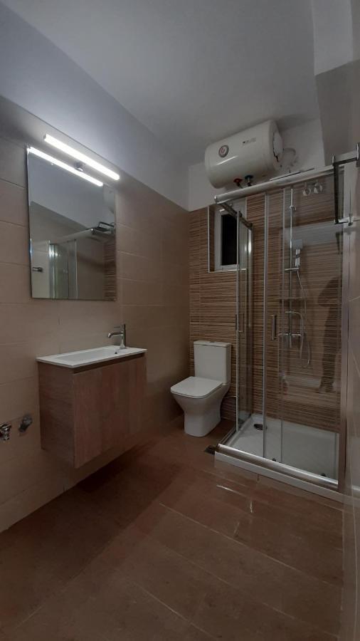 Tasias Apartments Ликсури Экстерьер фото